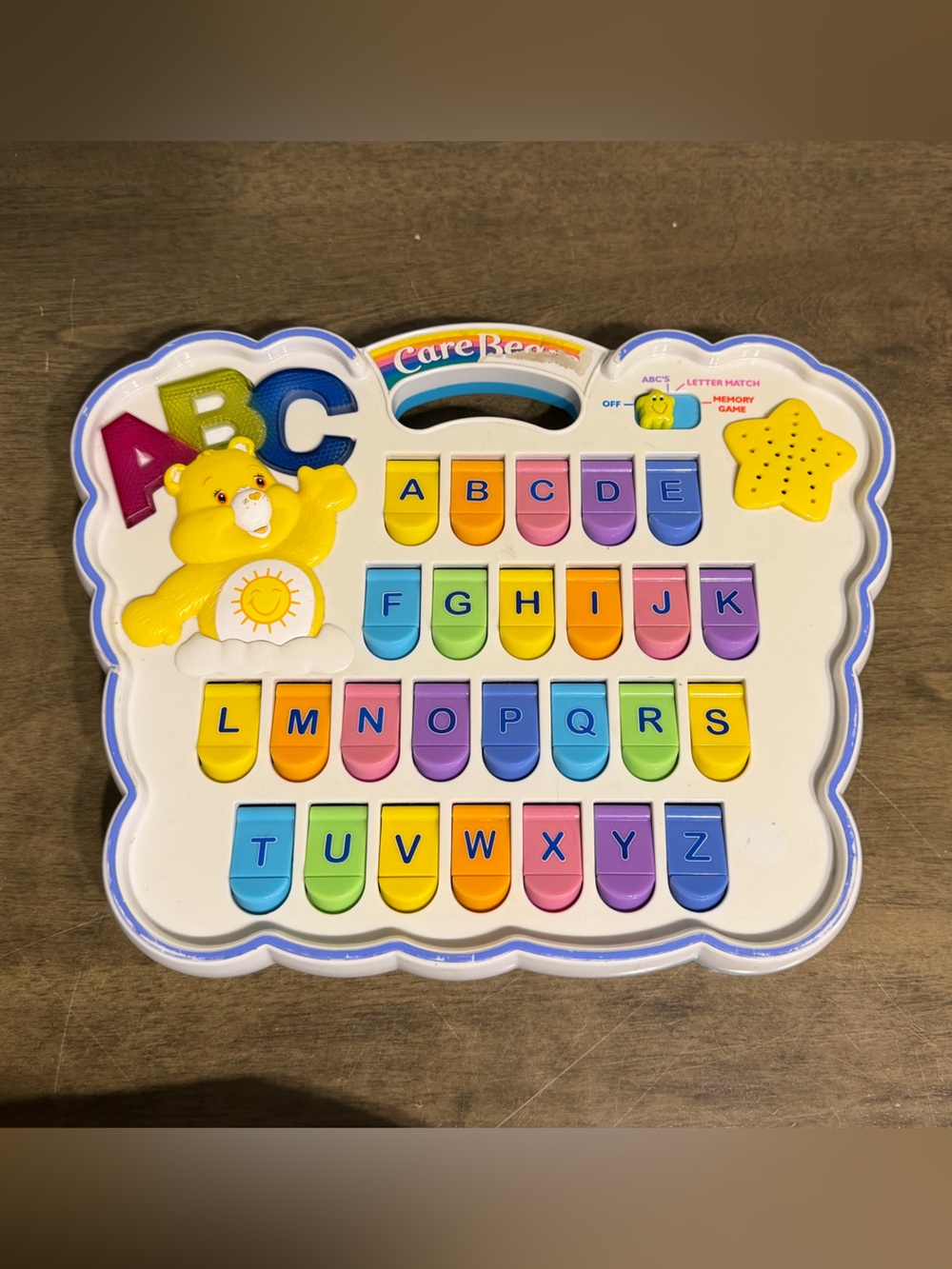 Care Bears ABC Electronic Game  ABC’s Letter Match Memory Game  Music Play Along